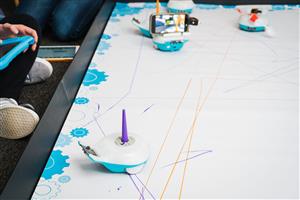 finch robots are programmed to draw geometric shapes